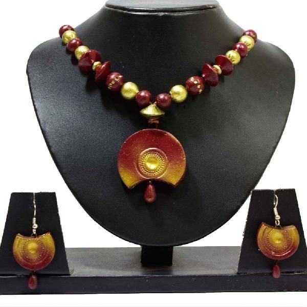Gold and Red Tint Beads With Pendant