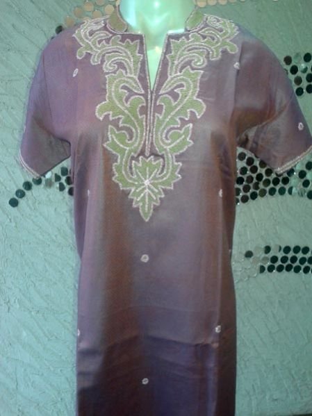 Nutan Pink Cotton Embroidered Kurti