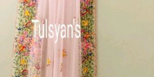 Hand embroidered Dupatta on net.