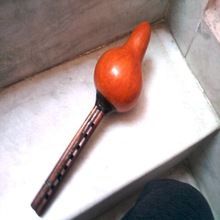 Wooden Snake Charmer