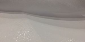 ONE SIDED TEAR AWAY NONWOVEN FABRIC WITH COATING