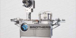 Volumetric Liquid Filling Machine with Capping or Plug Pressing