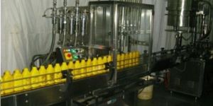 Automatic 4 Nozzle Bottle Filling Machine