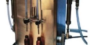 HEAD LIQUID FILLING MACHINE