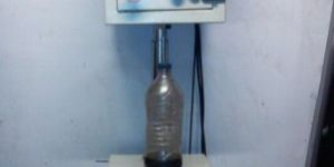 SINGLE NOZZLE BOTTLE FILLING MACHINE