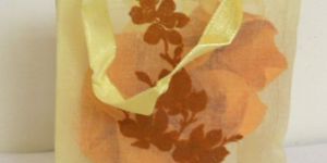 Yellow Color with Brown Flock Print Organza Fabric Bag