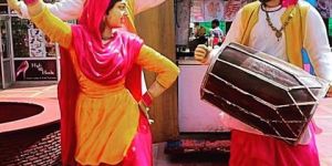 FIBERGLASS PANJABI DANCING STATUE