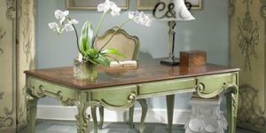 CARVINGS SIGNATURE COLLECTION TABLE