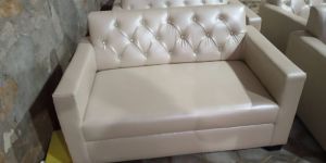 Creme Two Seater Rexine Sofa