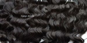 UNPROCESSED WAVY HAIR EXTENSION