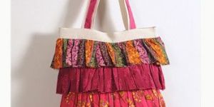 TRADITIONAL RED FRILLY BAG