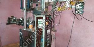 Automatic pouch filling & sealing machine