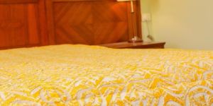 Yellow Leheriya Applique Bedcover