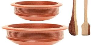 Red Clay Pot And Wooden Spatula