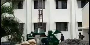 Concrete Mixer with Attached Ladder Hoist