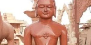 Red Stone Buddha Statue