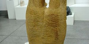 YELLOW MARBLE STONE COUPLE SCULPTURE