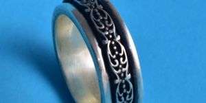 Sterling Silver And Brass Floral Spinner Divine Ring