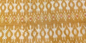 Orange Tribal Motif Cotton Ikat Handloom Fabric
