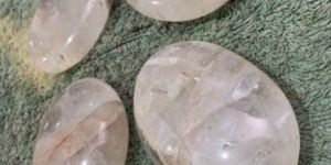 Oval Shaped Clear Quartz Plam Gemstone