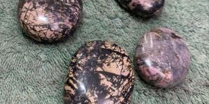 Oval Shaped Rhodonite Palm Gemstones