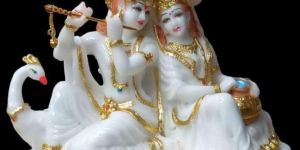Krishna and Radha with Peacock Statue