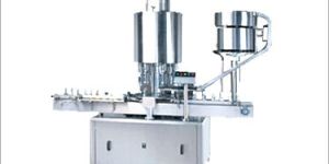 FOUR HEAD CAPPING MACHINE