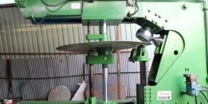 DISH END SPINNING MACHINE