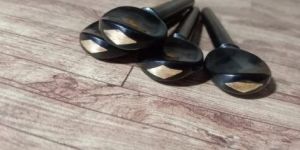 Ebony Pegs with Brass Eye