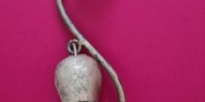 Iron gold bells. String of 6 garden cowbells. Indian cow bells