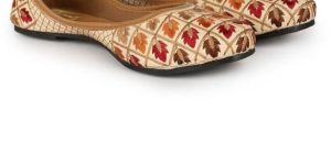 the Desi Dulhan Women Golden Unique Embroidered Jutti with PVC Sole