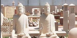 Pink Sandstone Buddha Sculpture