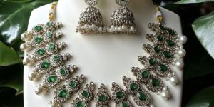 Brass Kundan Set with Green Stones