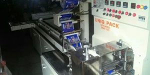 AUTOMATIC SOAP PACKAGING MACHINE