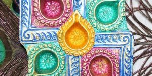 Multicolored Swastik Clay Diya