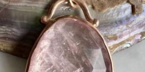 Ladies Uneven Shaped Rose Quartz Pendant