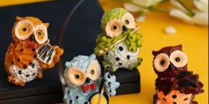 Four Musical Owl Statue Set