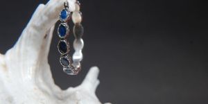 Silver Hoop Earrings with Sapphire Blue Stones