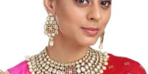 Woman Neckline Kundan Set