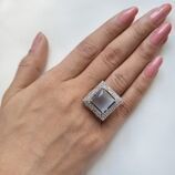 SILVER PLATED RING WITH SMOKY STONE AND AD STONES