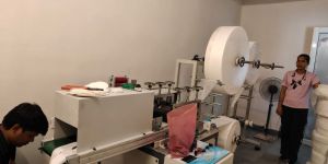 Sanitary Napkin Making Machine