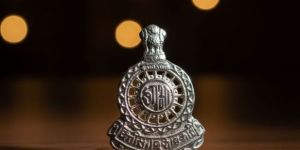 excise cap badge