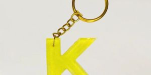 Trendy Yellow Resin Keychains with K Initials