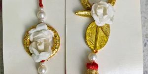 White Flower & Pearls Couple Rakhi For Bhaiya Bhabhi (Set OF Two)