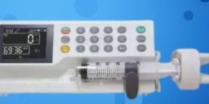 NISCOMED SYRINGE PUMP