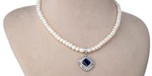 Women Pearl Brilliance And Blue Stone Necklace Earring Set