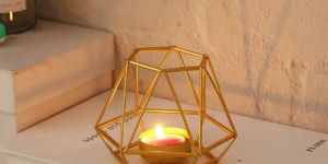 a geometric gold metal tealight holder