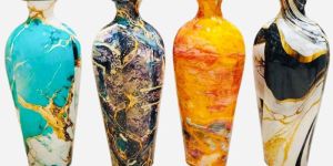 A Set of Four Tall Vases with a Glossy Marbleized Finish