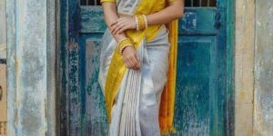Women Yellow Color Lichi Silk Woven Traditional Saree