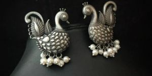 Women Silver Lookalike Peacock Stud Earrings